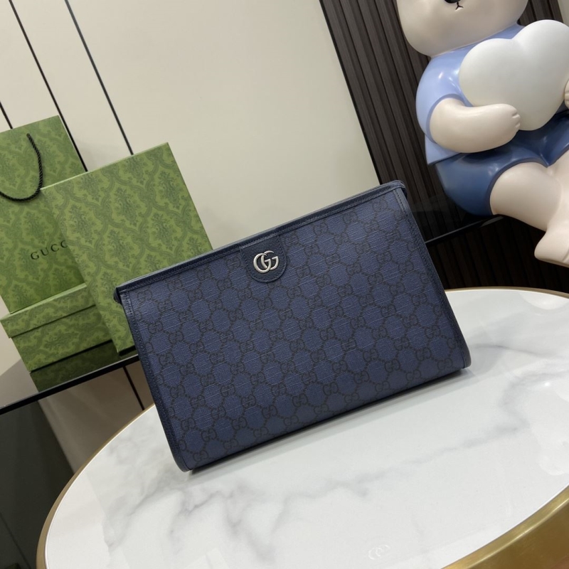 G*u*i clutch bags